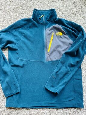 The North Face Teal Half-Zip Fleece with Gray Chest Panel and Yellow Accents